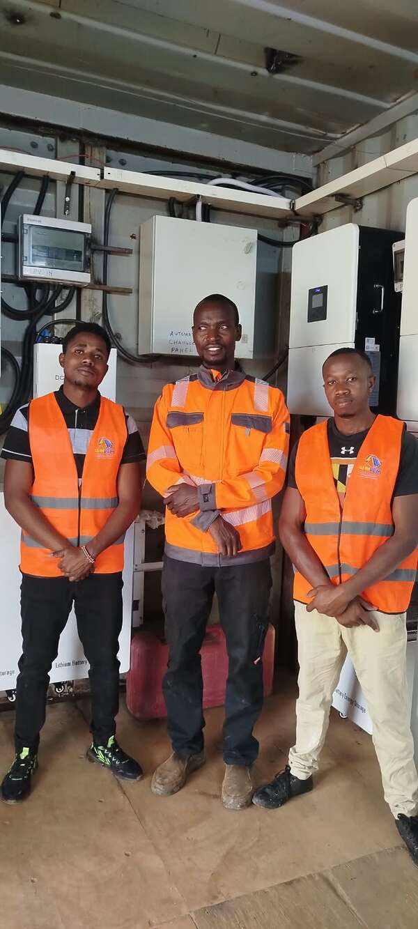 SunPem Agency team working in a battery room during a commercial solar installation